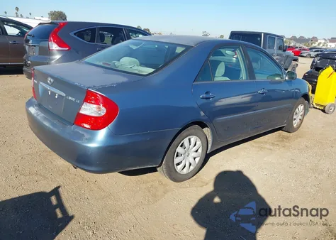 2004 Toyota Camry Le z USA, uszkodzony, nr VIN 4T1BE32KX4U877017